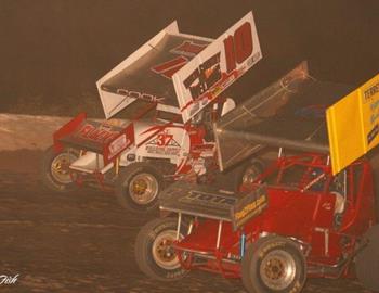 Jeff Cook (10) battles at Cayuga County Fair Speedway