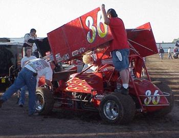 Scraping mud at Junction Motor Speedway