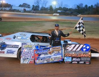 Clayton Miller in Victory Lane at 411 Motor Speedway on November 26, 2022. (Chad Wells image)