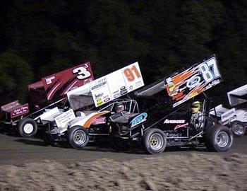 Three-wide at Tulsa Speedway