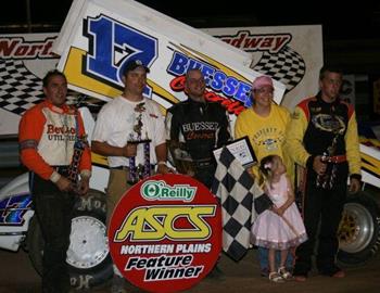 Billy Balog joined in victory lane by runner-up Lee Grosz (right) and Jerry Richert, Jr. (left)