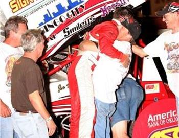 Joe Wood, Jr., and crew celebrate a Kennedale Speedway Park victory