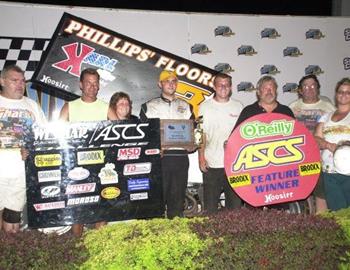 Kaley Gharst scored his first ASCS win in the Thursday qualifying feature