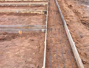 Manufactured or Modular Home Foundation with All Runners Reinforced with Rebar