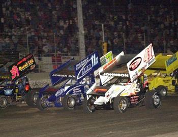 Jason Johnson (41), Gregg Bakker (11x) and Scott Butz (34) lead the three-wide salute