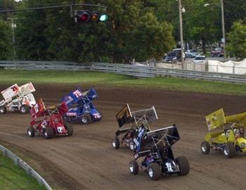 Brian Brown leads a heat race field into turn one