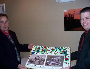 Champions Tim Hogue and Chuck Hebing with the cake