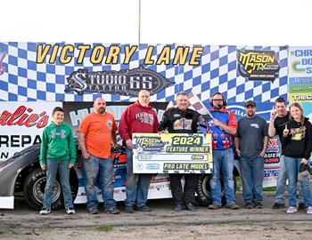 Jeff Aikey poses in Victory Lane after his win at Mason City Speedway (Mason City, Iowa) during the Pro Late Model Tour on May 5.