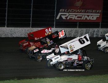 Danny Jennings (61J), Jeff Heffner (14) and Jason Martin (36) lead the three-wide