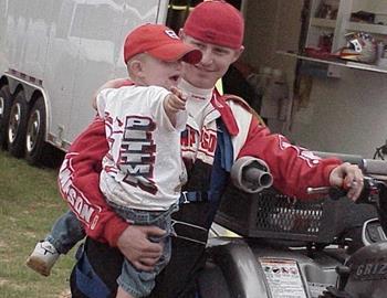 Jason Martin spends time with his son prior to racing action