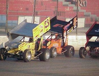 Taylor, Peebles and Leep race down the backstretch