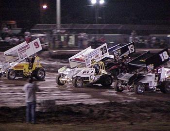 Tony Bruce Jr (18), Travis Rilat (29) and Gary Wright (9) lead the 3-wide