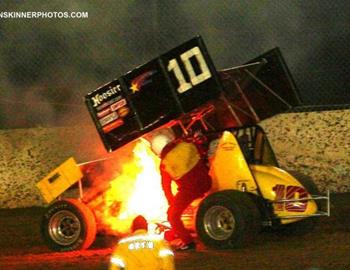 Larry Hartwell bails out of his burning machine