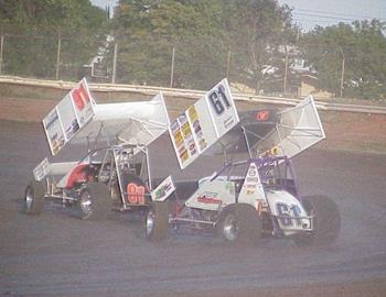 Darren Stewart (91) and Toby Brown (61a) in heat race action