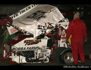 The remains of Jake Peters Sprint Car after a wild opening lap crash