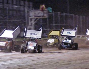 Racing down the front stretch.