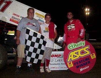 Car owner Bobby Sparks joins Darren Stewart in victory lane