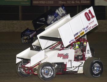 Gary Wright (01) races underneath Randy Martin (14)