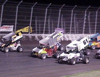 Three-wide salute at Dodge City