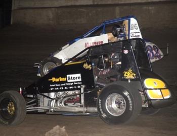 Jesse Hockett (8) and Kevin Swindell (32) race for the lead