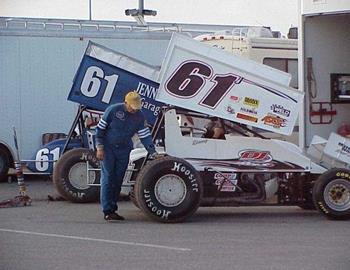 Earnest Jennings checks on grandson Dannys right rear tire