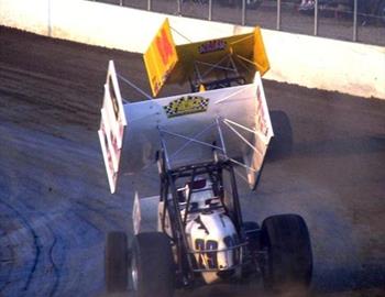 Wayne Johnson (94) leads Travis Rilat (29) off turn two