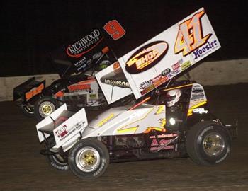 Jason Johnson (41) battles with Gary Wright (9) in the feature