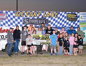 Kevin Opheim claims a USRA - United States Racing Association Stock Car victory at Mason City Motor Speedway on June 30