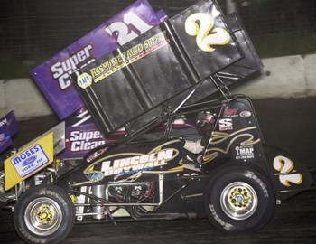 Don Droud, Jr. (2) and Brian Brown (21) battle it out