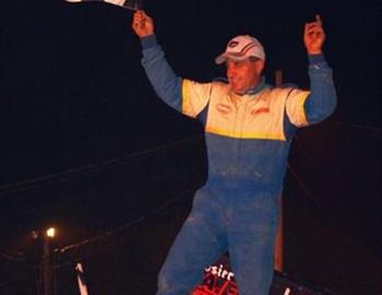 Chuck Hebing celebrates at Rolling Wheels Raceway