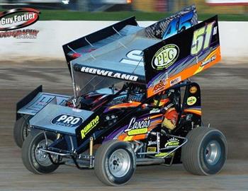 Bryan Howland (51) and Chuck Hebing (45) race for the lead at Fulton