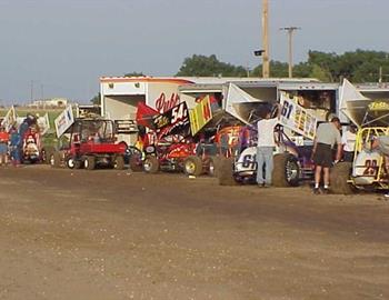 A busy pit area at Tech Motor Speedway