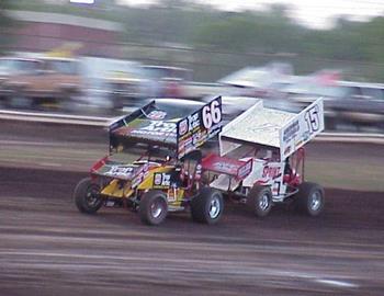 Danny Wood (66) races with Nick Smith (15s)