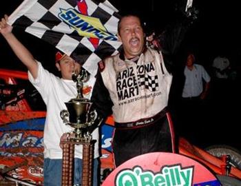 Charles Davis, Jr., celebrates a last-lap triumph