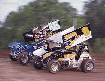 Gary Wright (9) and Jan Howard (46) in heat race action