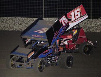 Jesse Hockett (75) and Travis Elliott (15T)