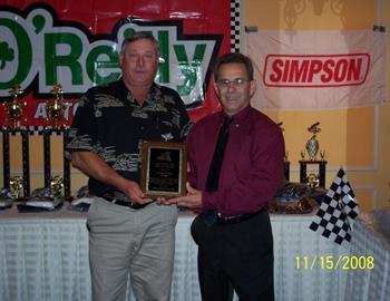 Greg Rilat received a plaque commemorating his 100th career ASCS Gulf South Region feature start