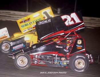 Brian Brown (21) and Terry McCarl (1m) race for the lead.