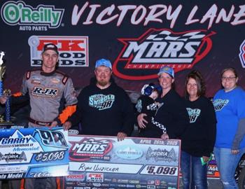 Ryan Unzicker wins the Gary Swibold Memorial at Peoria Speedway on April 26.
