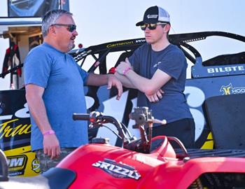 Randy Weaver (left) and Cameron Weaver talk before action at All-Tech Raceway on April 12.