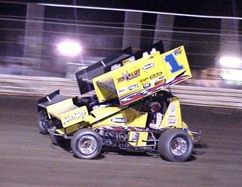 Close quarters racing in the feature between Terry McCarl (1m) and Jason Johnson