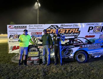 Garrett Wiles poses in Victory Lane after winning at Crystal Motor Speedway during their weekly Super Late Model show on May 25.