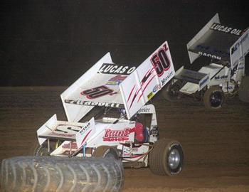 Zach Chappell (50z) holds off Brady Bacon for the lead in the feature event