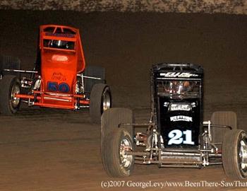 Cory Kruseman (21) and Charles Davis, Jr. (50) battle for the lead