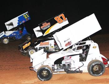 Travis Elliott (15T), Billy Melton (87) and Tommy Bryant (21T)