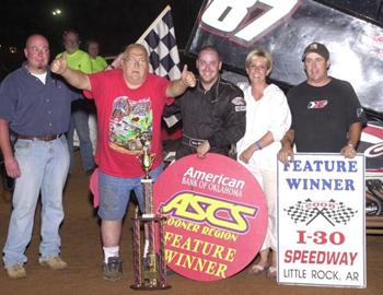 Brian McClelland and crew in victory lane at I-30 Speedway