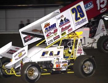 Travis Rilat (29) races with Michael Brown (15b)