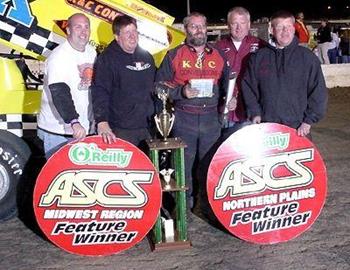 Chuck Swenson in crew enjoy victory lane on Sunday night