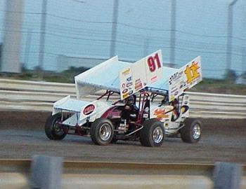 Darren Stewart (91) and Garry Lee Maier (11x) race for position