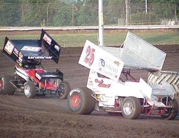 Derek Cottrell (25) leads Dara Morrow (58) through turn four